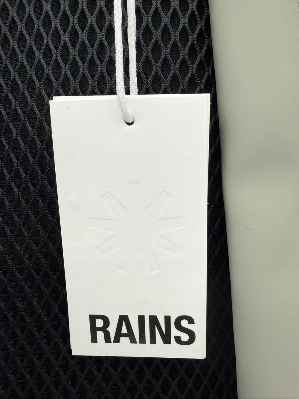Rains Rolltop Rucksack W3 Backpack in Light Gray with Black Strap